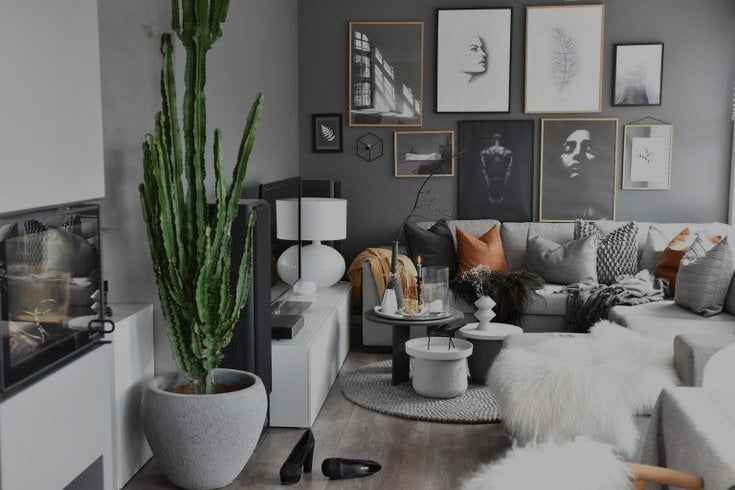 Cozy living room setup with decorative pillows and ambient lighting.