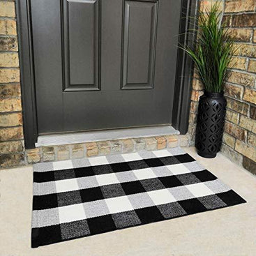 Soft and durable cotton buffalo plaid rug, perfect for adding style to any room.