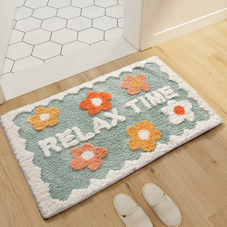 Floral area rug with anti-slip backing, perfect for bathroom and living room use.