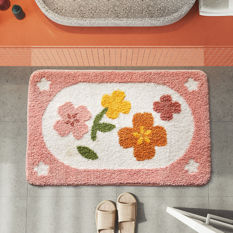 Soft and vibrant floral rug with anti-slip backing, perfect for adding charm to bathrooms and living rooms.