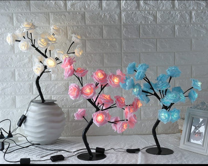 Rose LED tree lamp with adjustable lighting for home décor.