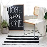 Stylish buffalo plaid cotton rug, designed to enhance your home’s entryway or hallway.