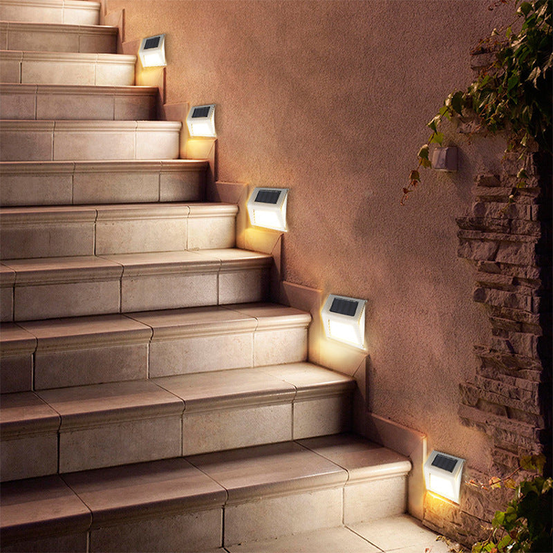 Eco-friendly solar-powered LED step lamp with waterproof design, perfect for illuminating your garden and outdoor stairs.