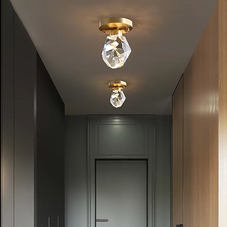 Energy-efficient crystal ceiling light pendant made of glass and metal, perfect for entrance and hallway lighting.