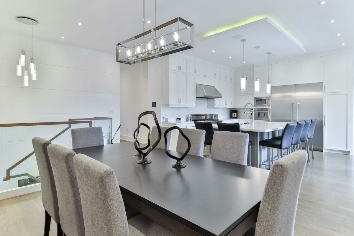Open kitchen with a dining table placed for easy circulation