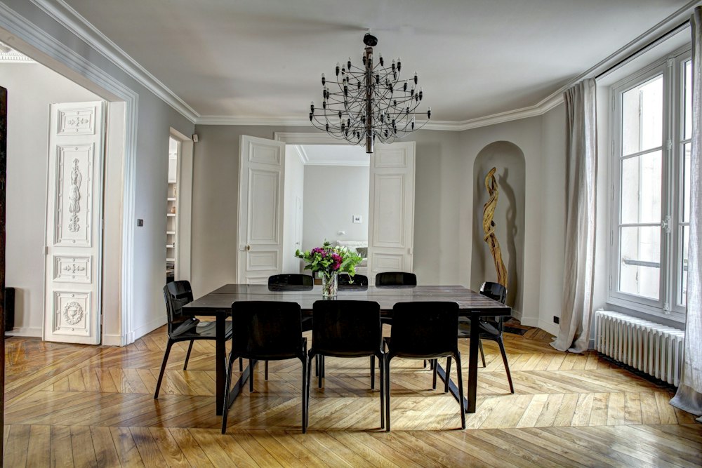 Wooden dining set in a light-filled room